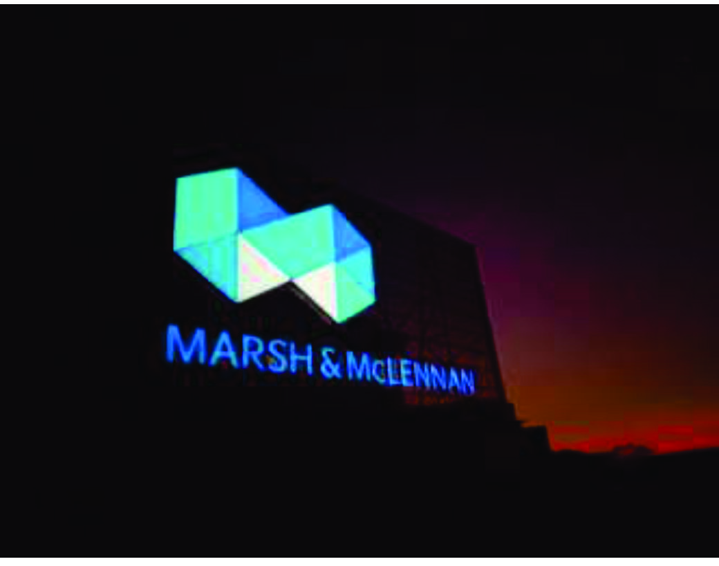 Marsh & McLennan Powai — illuminated LED façade at dusk